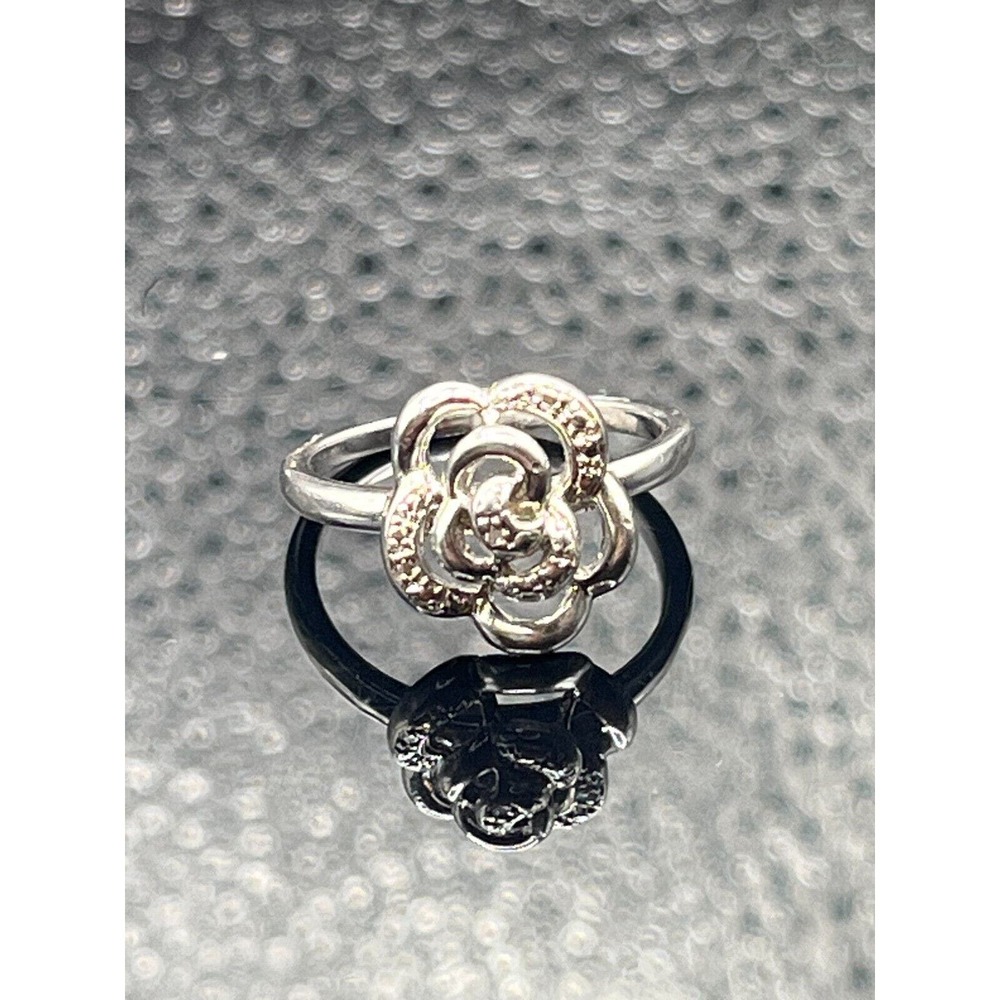 Sterling Silver Flower ring set with Genuine Diamonds stamped SAI 925